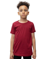 Child wearing a red t-shirt against a plain background