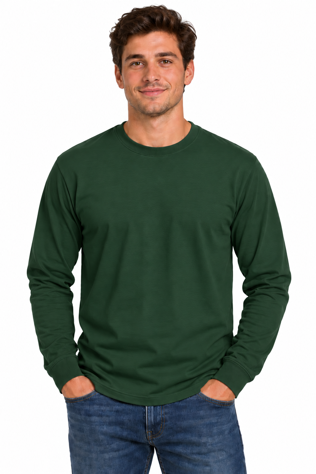 A man wearing a dark green long-sleeve crewneck shirt and blue jeans, standing against a plain white background.
