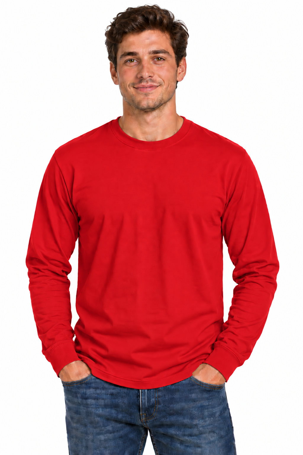 A man wearing a bright red long-sleeve crewneck t-shirt and blue jeans, standing against a solid white background.
