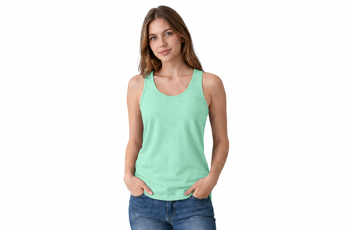 A woman modeling a mint green sleeveless tank top with blue jeans, standing against a plain white background.