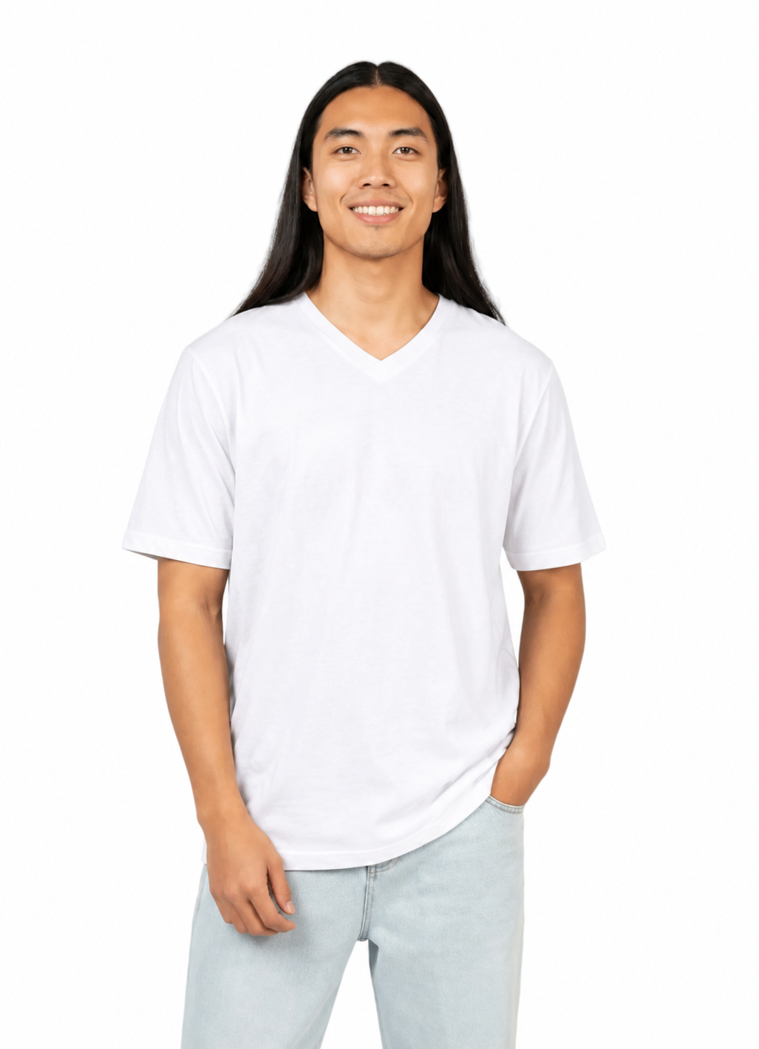 A smiling man with long black hair wearing a plain white short-sleeve V-neck t-shirt and light blue jeans, standing against a solid white background.