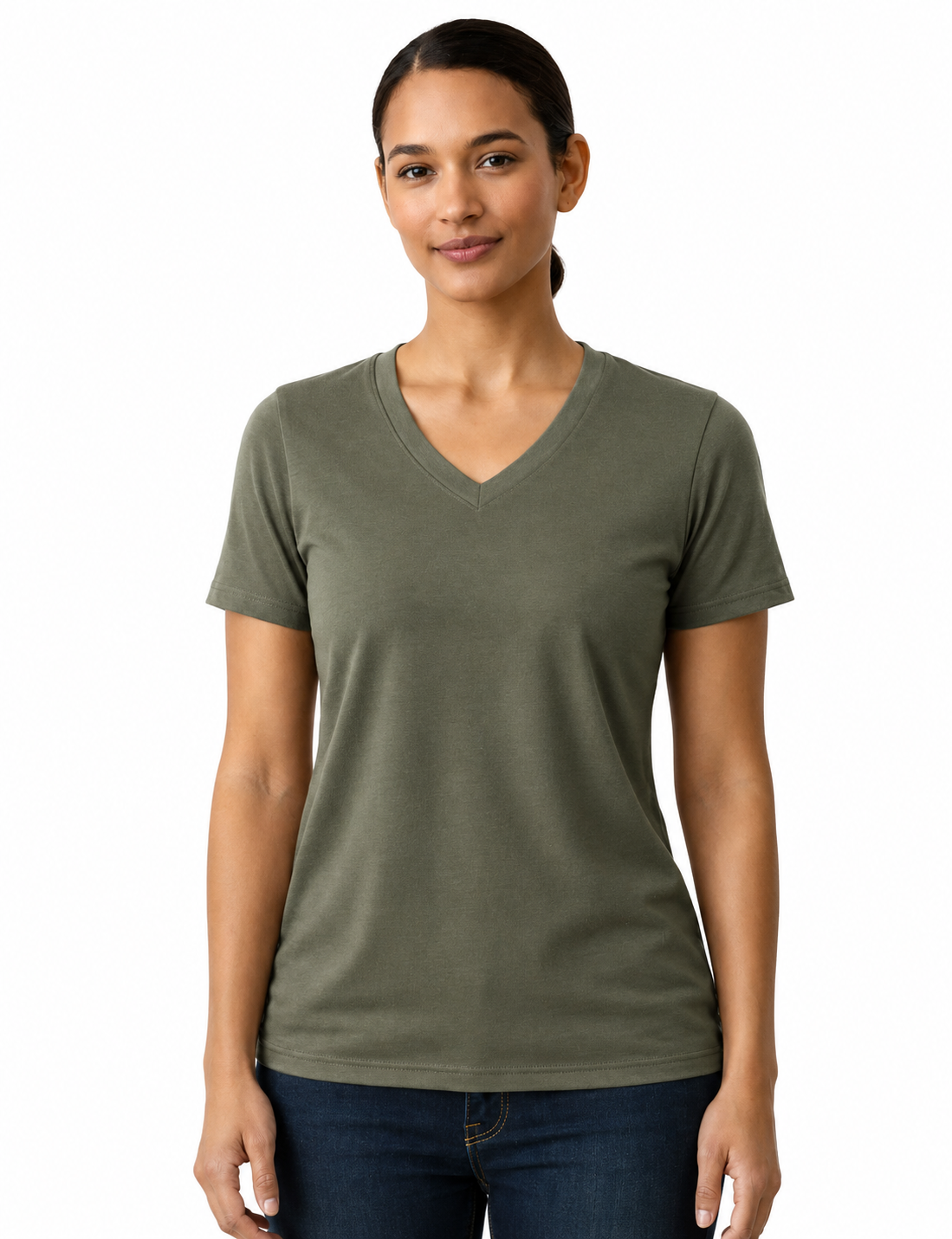 A woman wearing a short-sleeve V-neck t-shirt in olive green, paired with dark blue jeans, photographed against a solid white background.