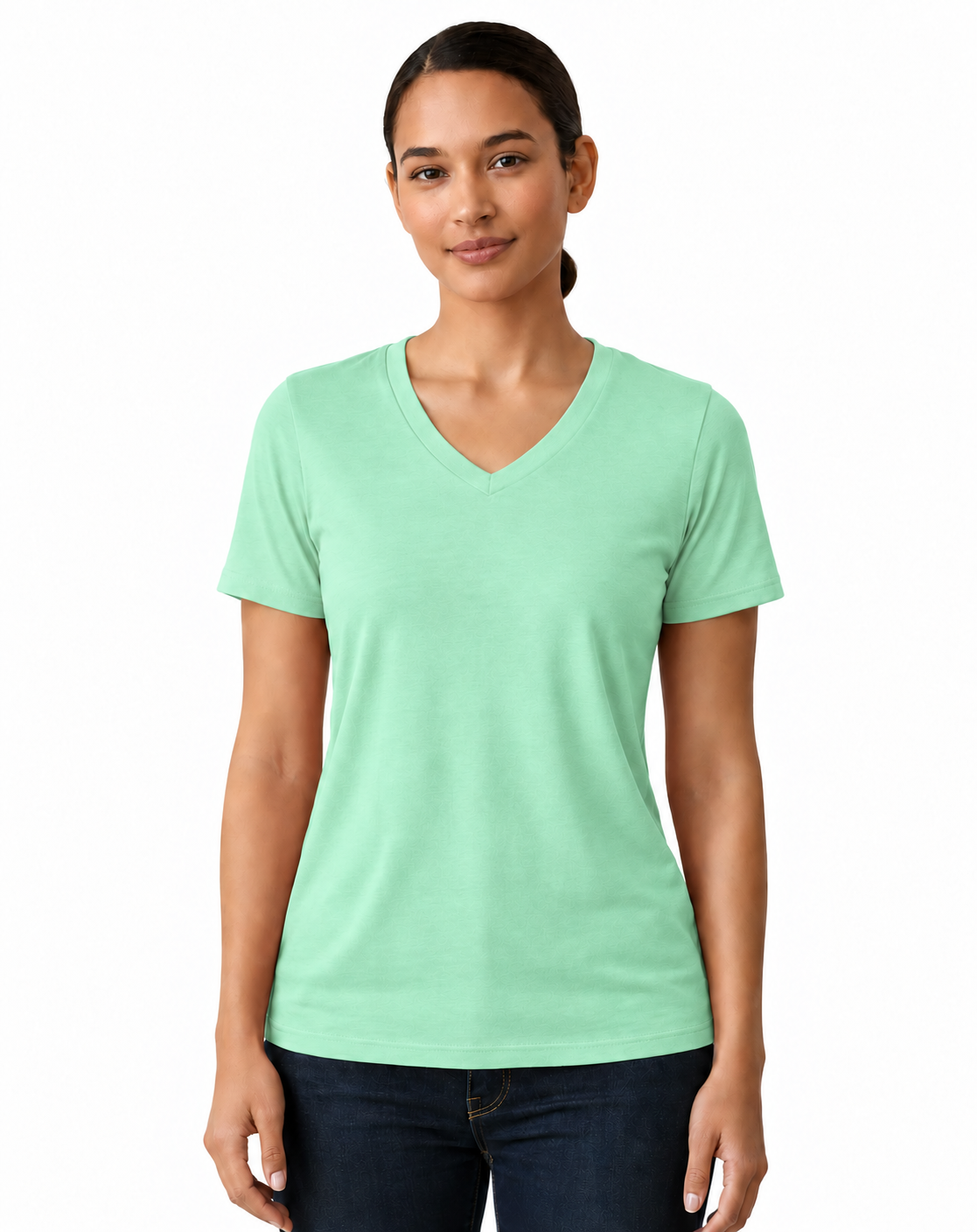 A woman modeling a light mint green V-neck short-sleeve t-shirt against a plain white background.