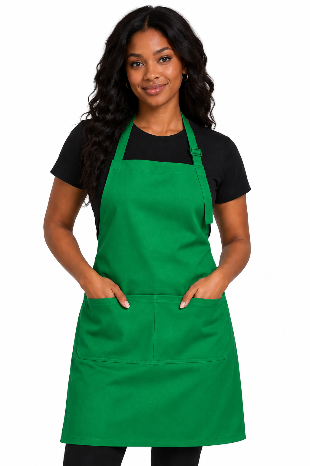A woman modeling a bright green bib apron with two front pockets over a black t-shirt, photographed against a solid white background.