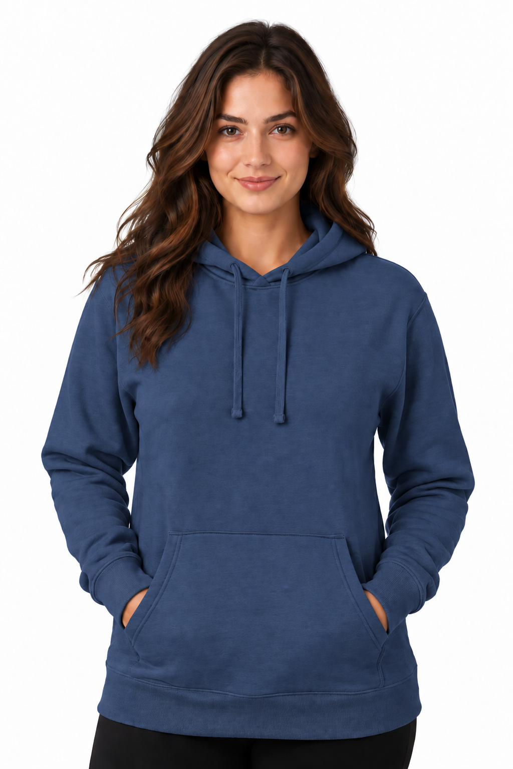 A woman with long brown hair wearing a slate blue pullover hoodie with a front kangaroo pocket and drawstrings, standing against a plain white background.