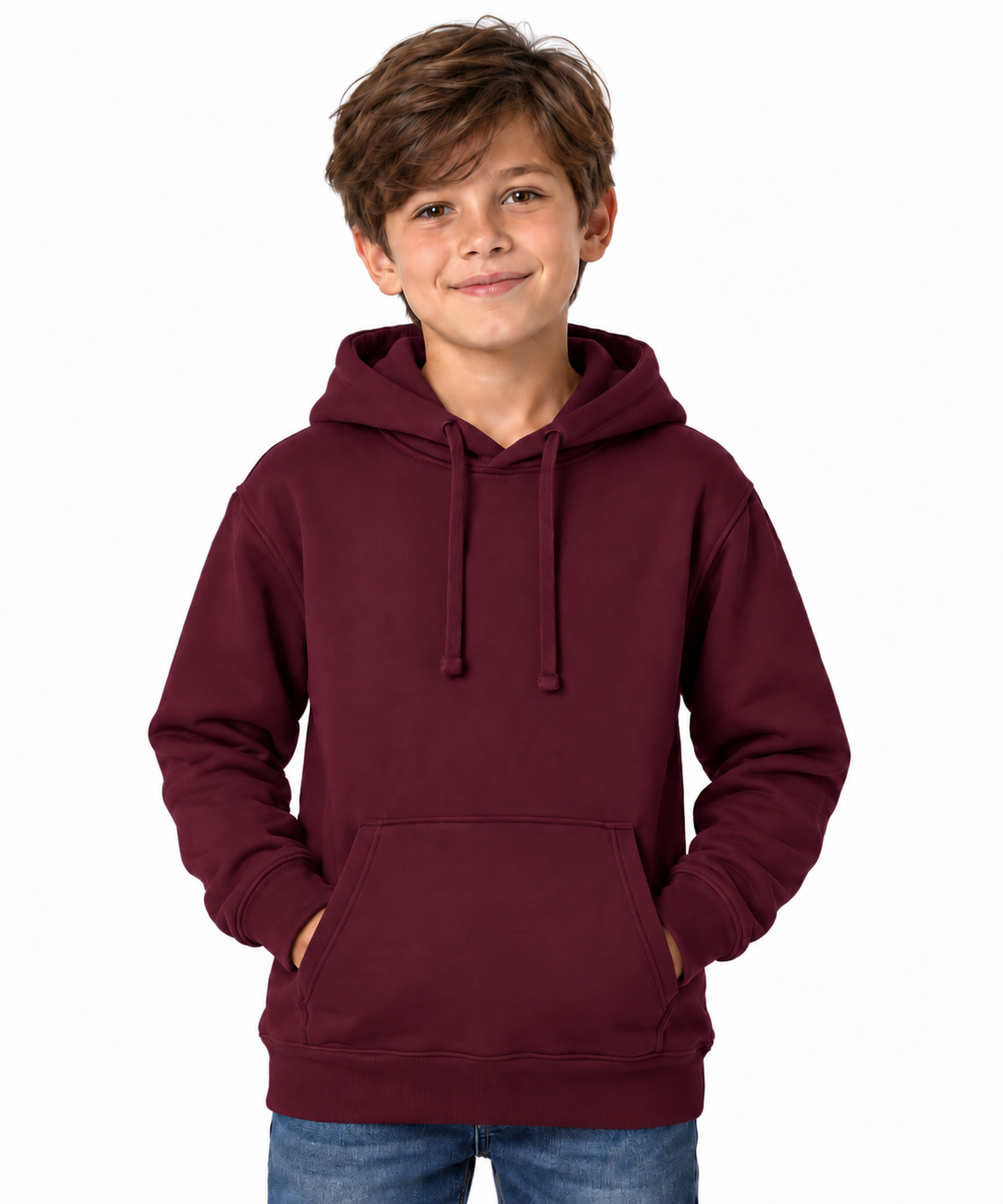 A young boy with brown hair wearing a maroon pullover hoodie and blue jeans, standing against a plain white background.