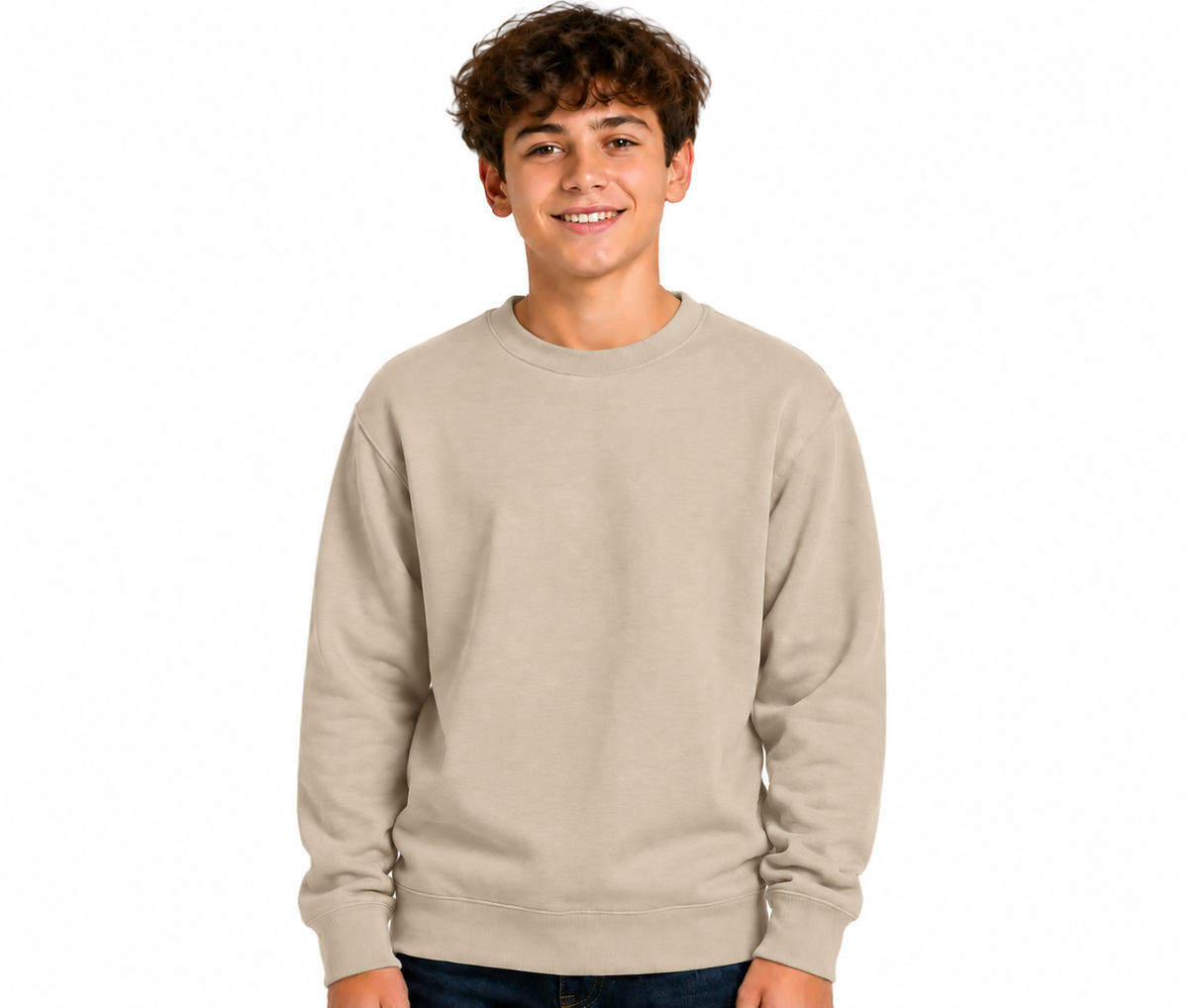 A smiling young man wearing a light beige crewneck sweatshirt, photographed against a solid white background.