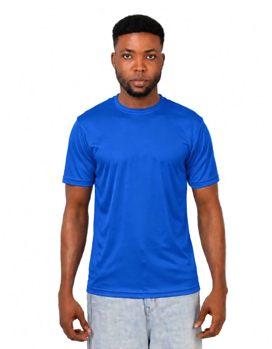 A man wearing a bright royal blue short-sleeve crewneck t-shirt and light wash jeans, standing against a solid white background.