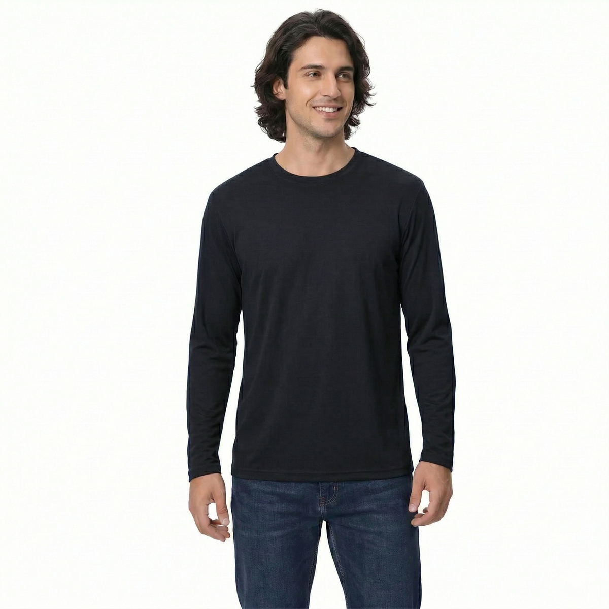 Man wearing a black long-sleeve shirt and blue jeans on a white background