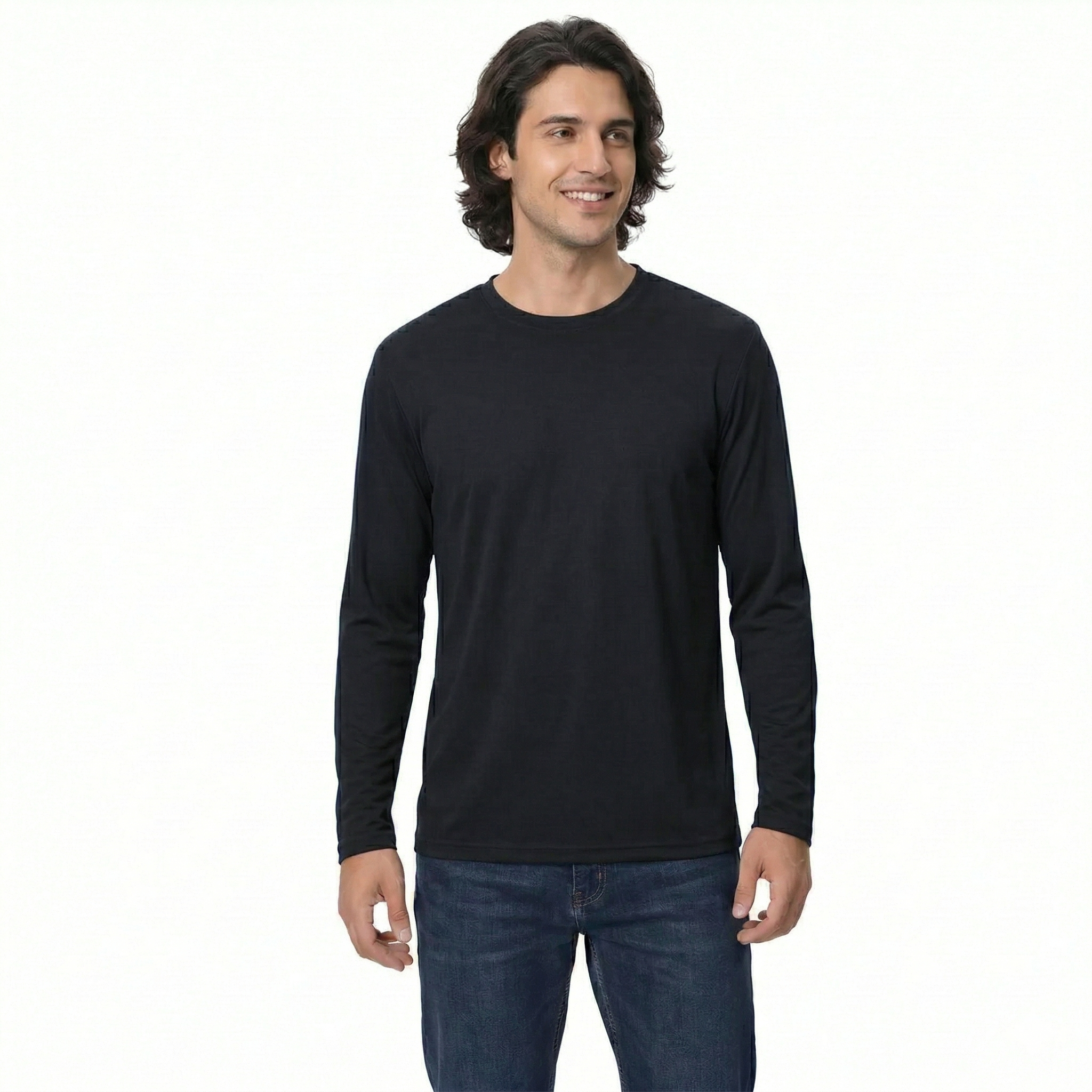 Man wearing a black long-sleeve shirt and blue jeans on a white background