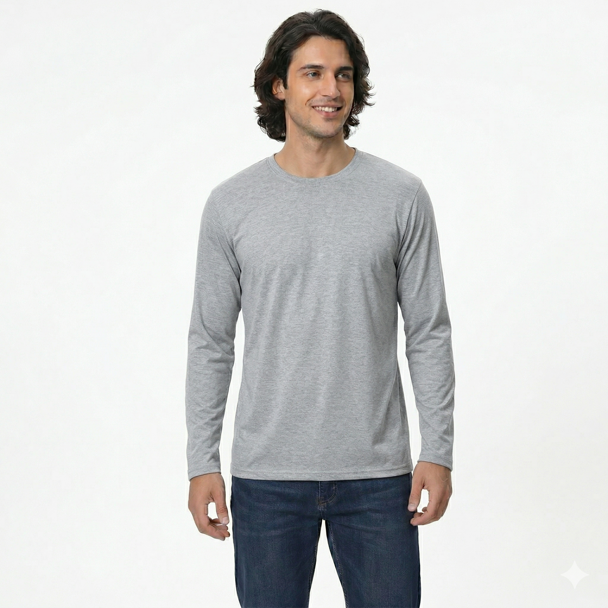Man wearing a gray long-sleeve shirt and blue jeans on a white background