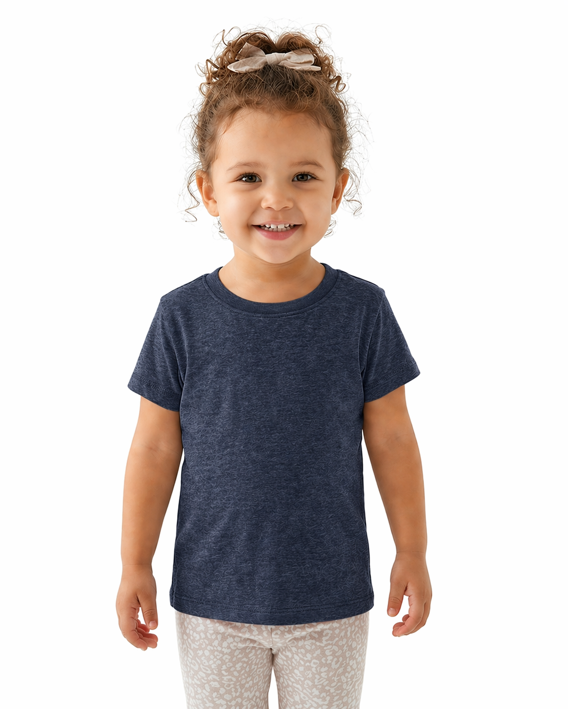 Child wearing a blue t-shirt on a white background