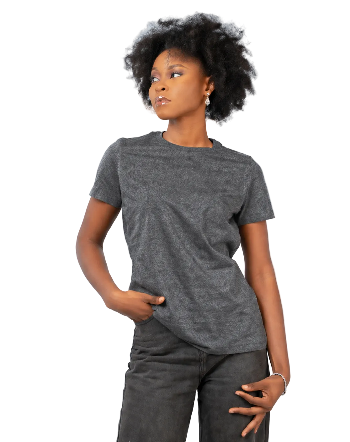 Person wearing a gray t-shirt and dark pants against a light background