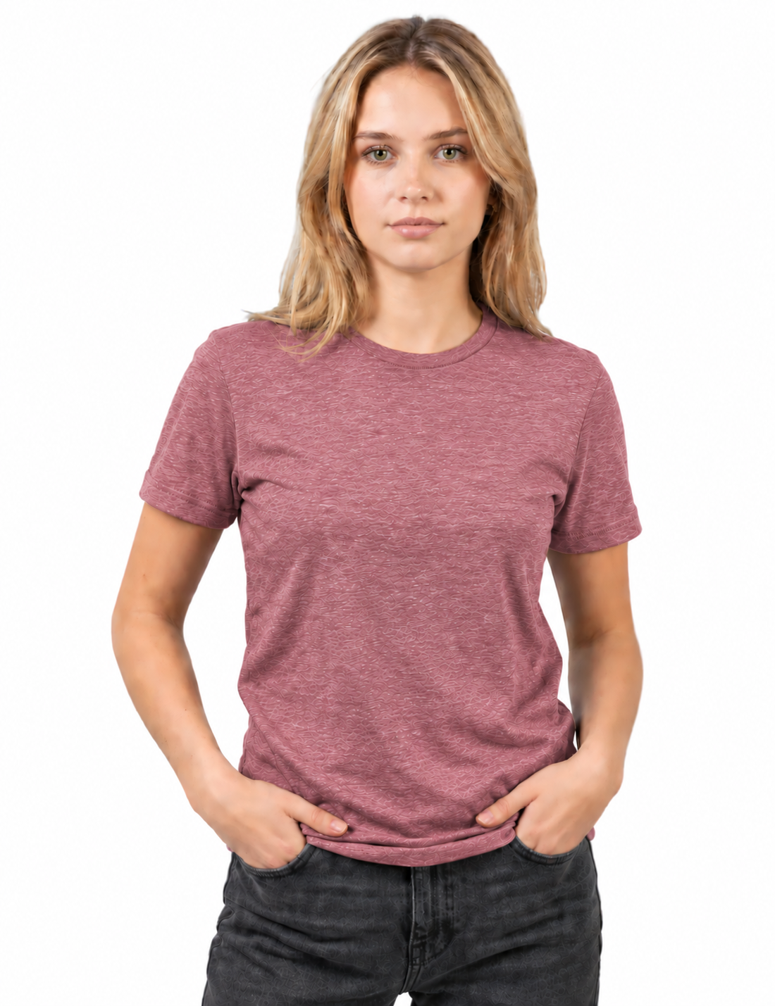 A woman modeling a short-sleeve crewneck t-shirt in a heathered dusty rose color, paired with dark gray jeans, against a plain white background.