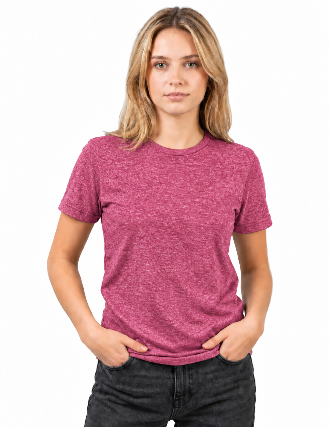 A woman with blonde hair wearing a heathered magenta short-sleeve crewneck t-shirt and dark gray jeans, standing against a plain white background.
