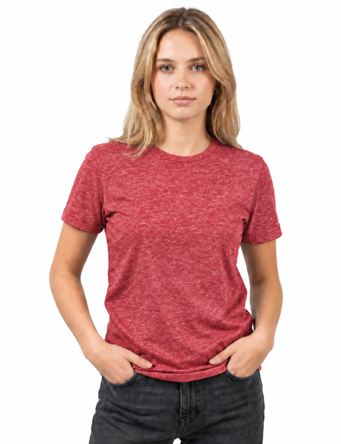A woman with blonde hair wearing a heathered red short-sleeve crewneck t-shirt and dark gray jeans, standing against a plain white background.