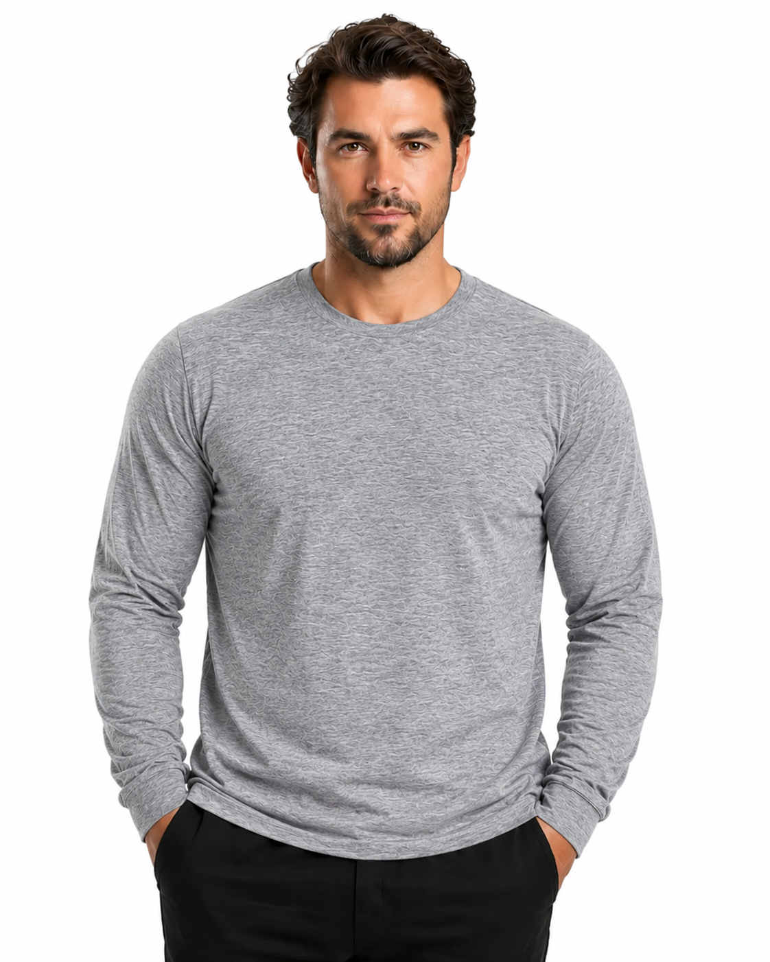 A man wearing a light gray long-sleeve crewneck shirt and black pants, standing against a plain white background.