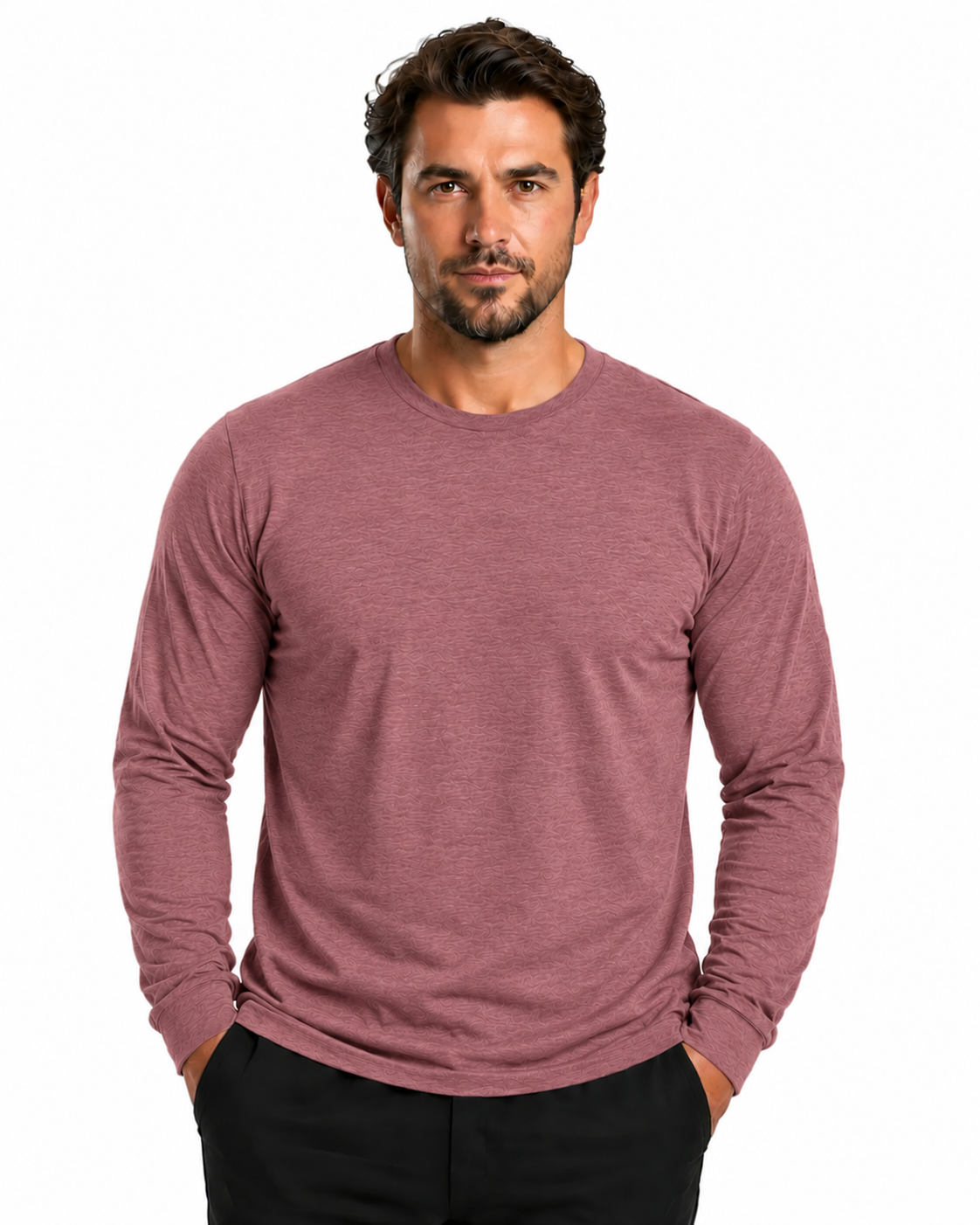 A man wearing a heathered dusty rose long-sleeve crewneck shirt and black pants, standing against a plain white background.