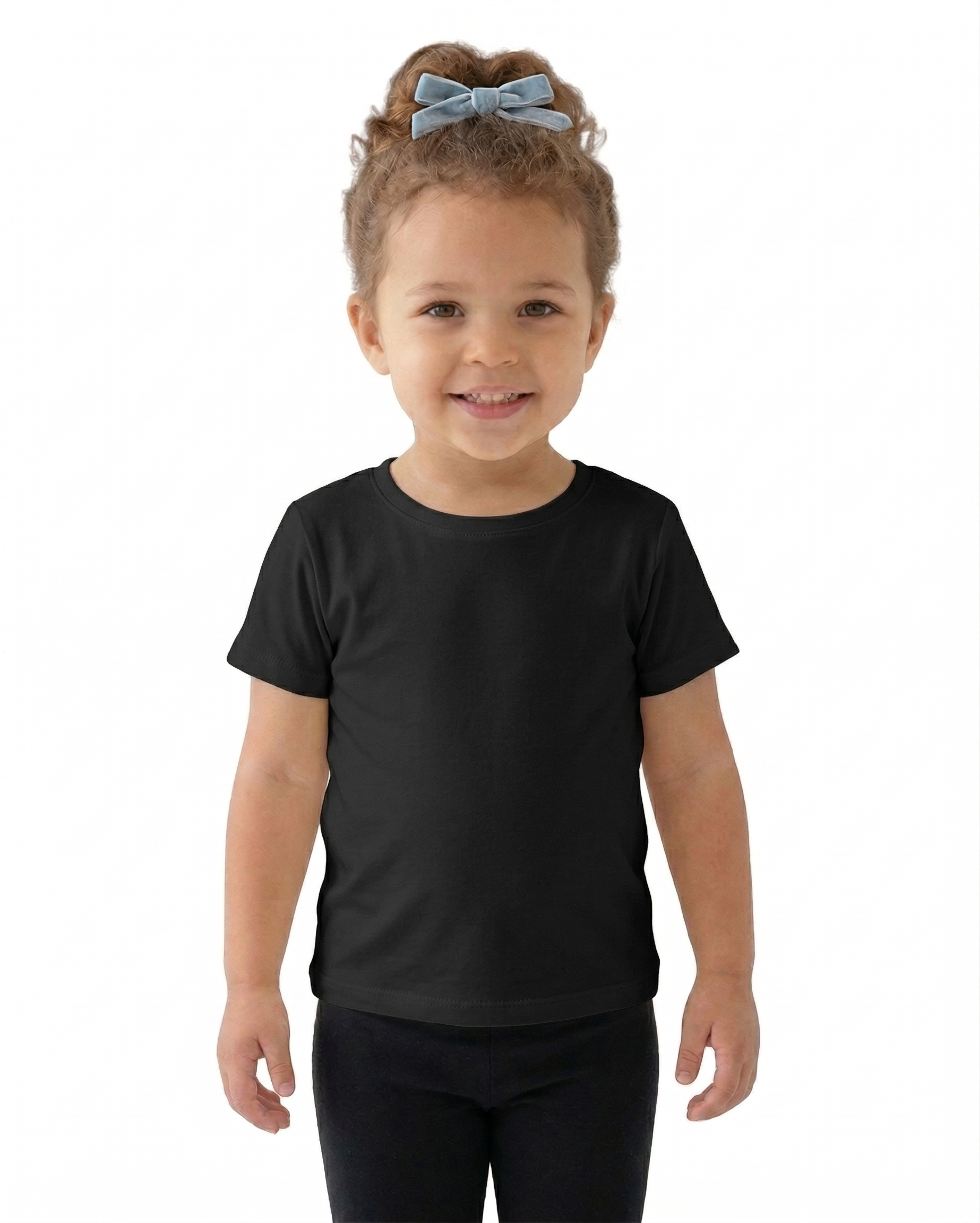 Young girl wearing a black t-shirt and black pants on a white background