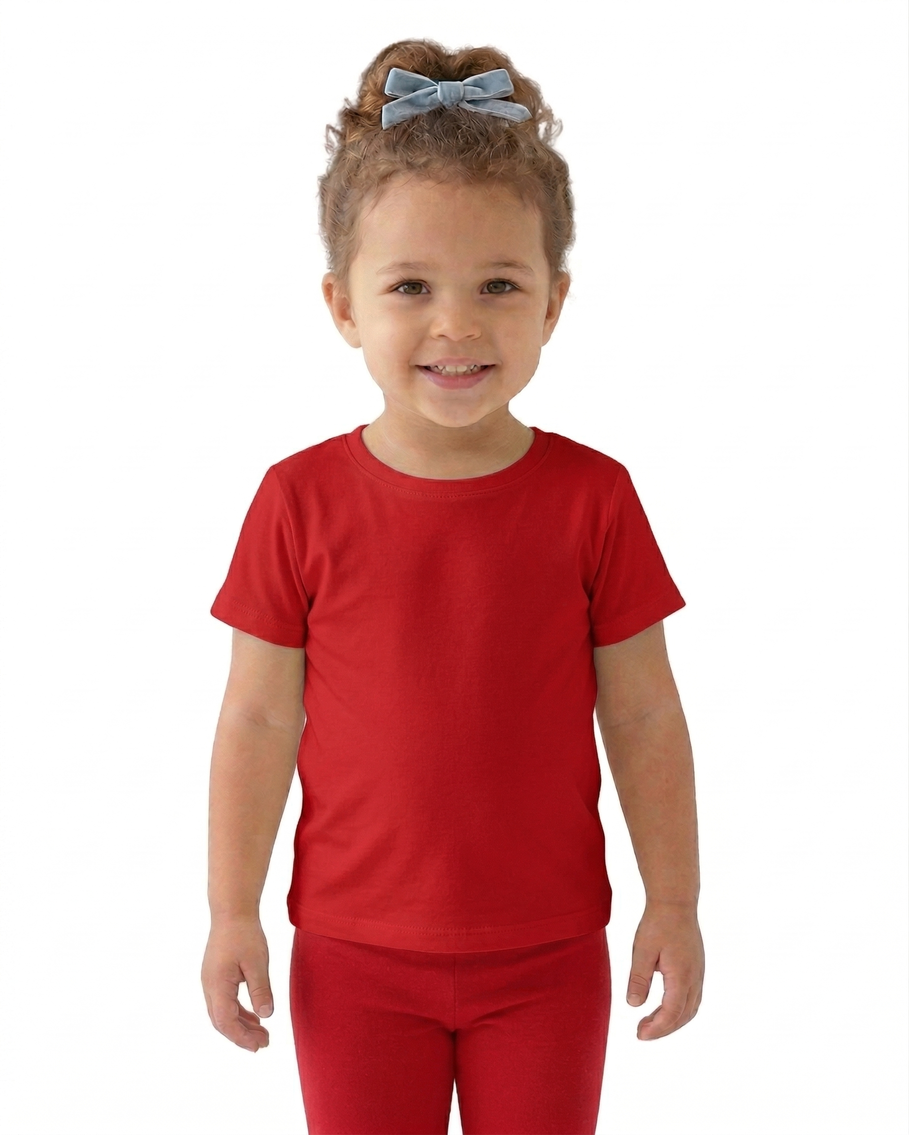 Young girl wearing a red outfit with a white background