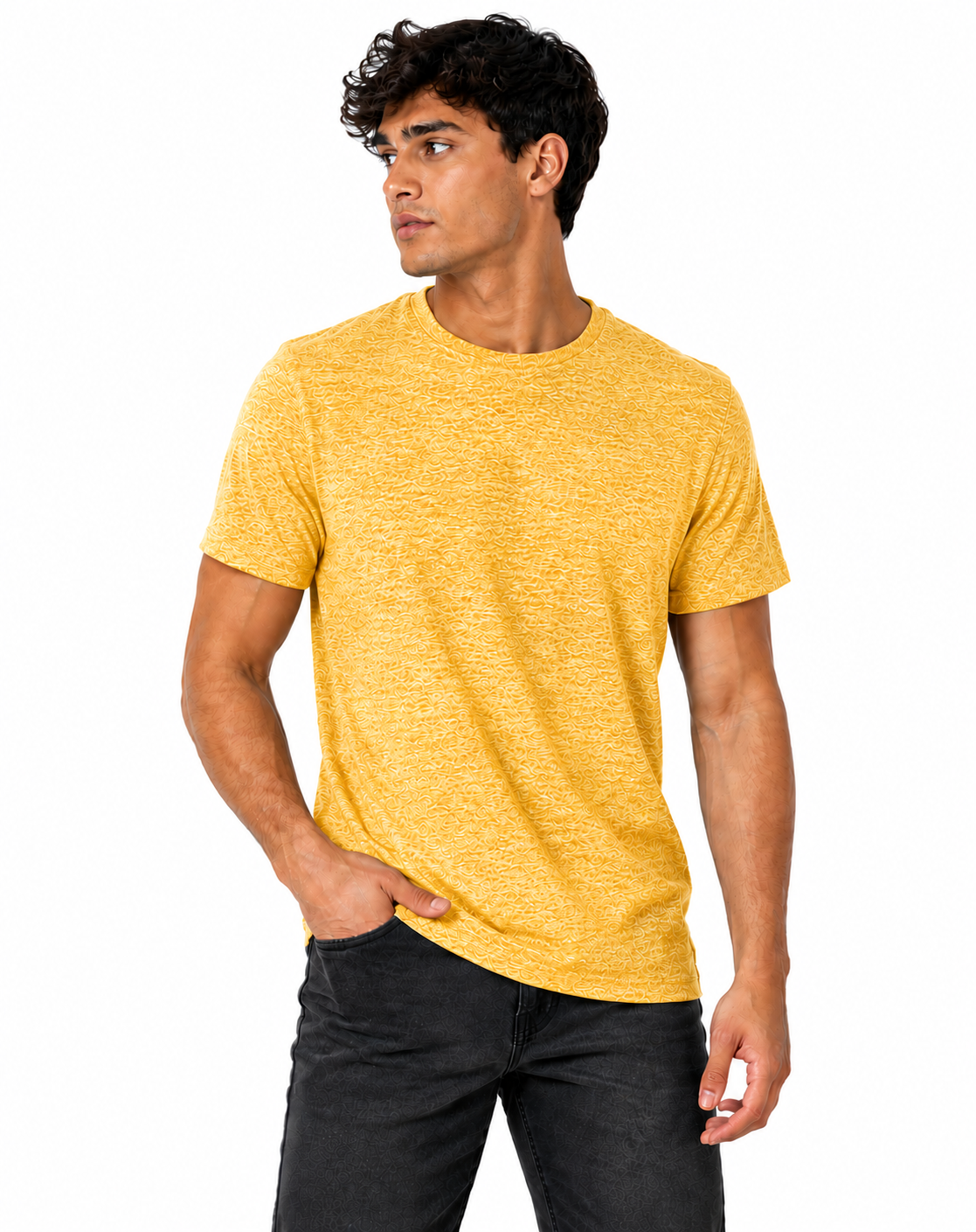 A man wearing a short-sleeve crewneck t-shirt in a heathered mustard yellow color, paired with black jeans, photographed against a solid white background.