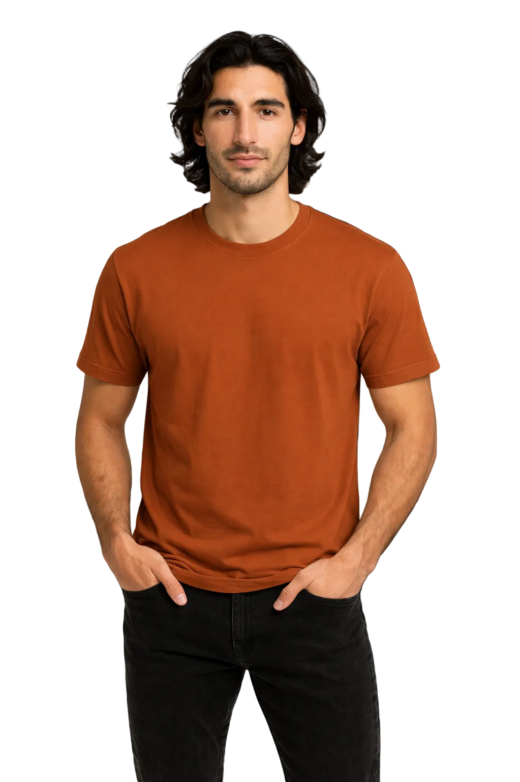 Man wearing a brown t-shirt and black pants against a dark background