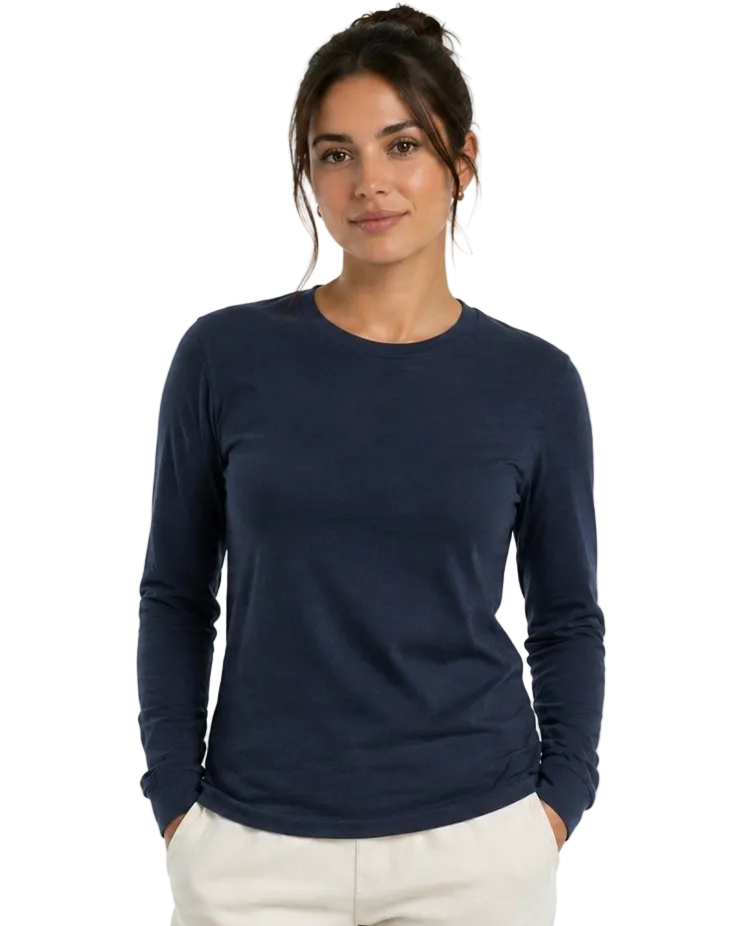 Woman wearing a navy long-sleeve shirt on a white background