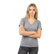Woman wearing a gray t-shirt against a white background