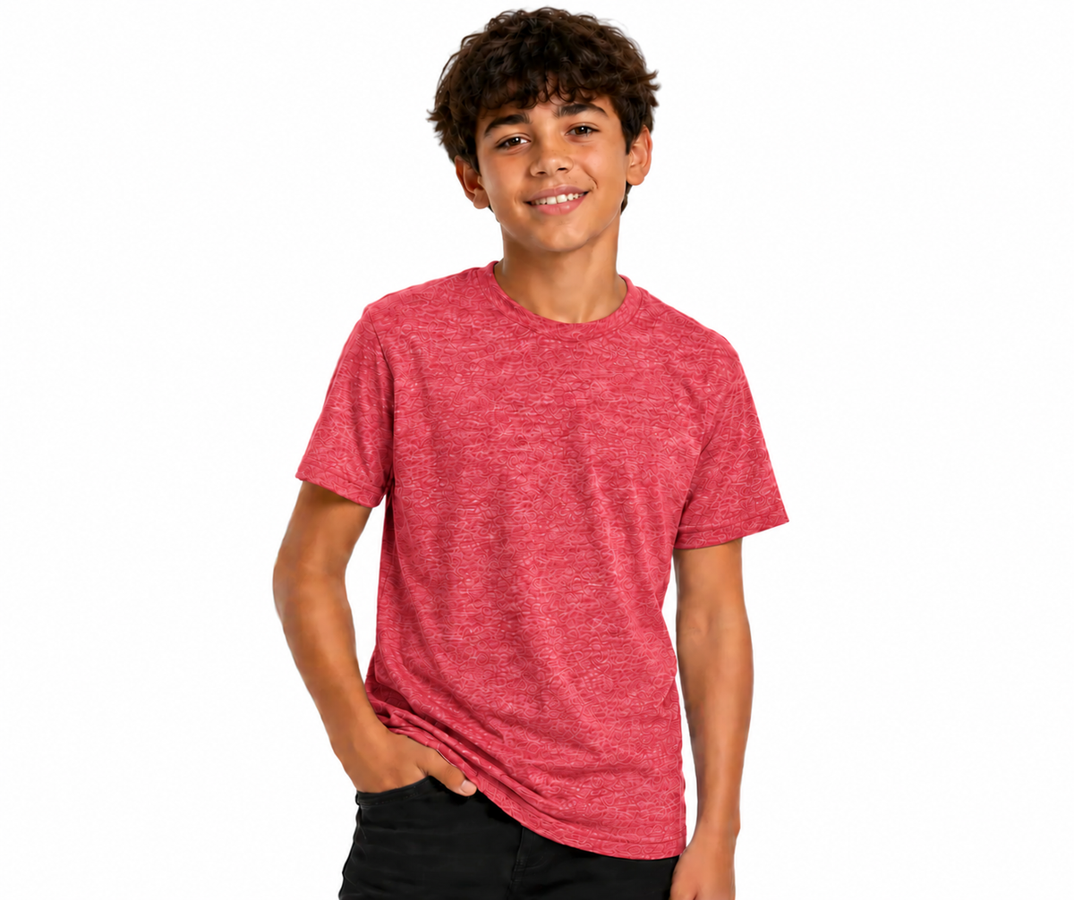 A smiling young man wearing a heathered red crewneck t-shirt and black pants, standing against a solid white background.
